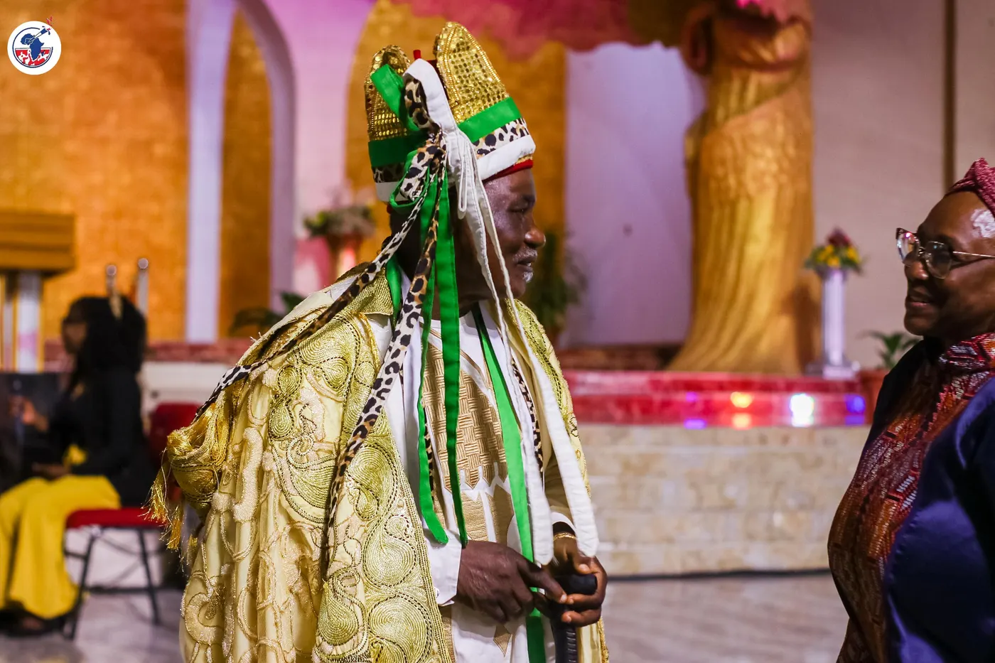 A traditional ruler in ceremonial regalia at the anniversary.