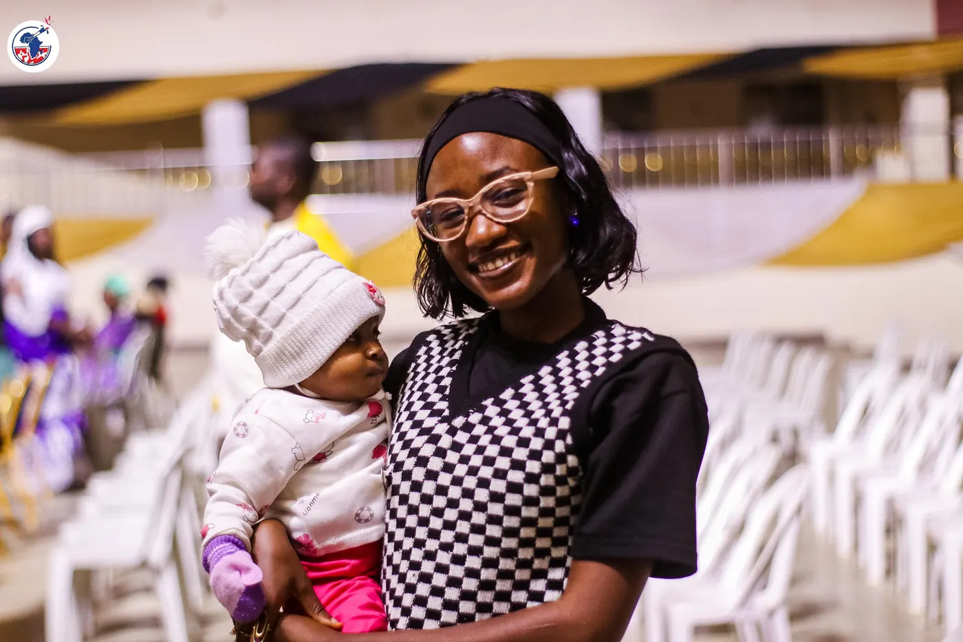 A young mother and her child at the WIGPA anniversary.